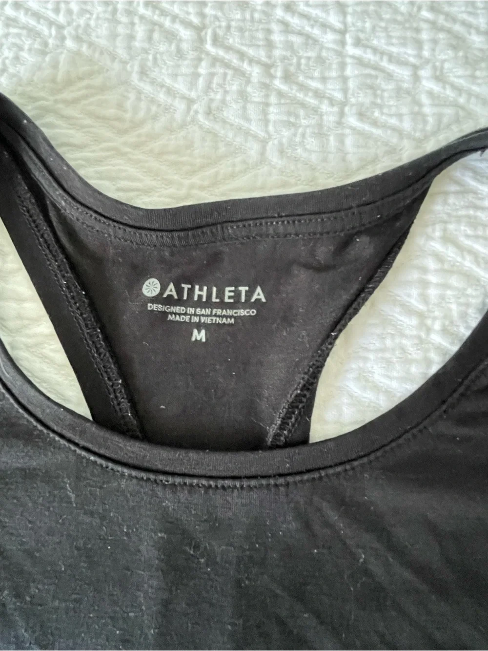 Athleta 1 black&grey camo ,capri and 2 black seize M plus 2 tank top M